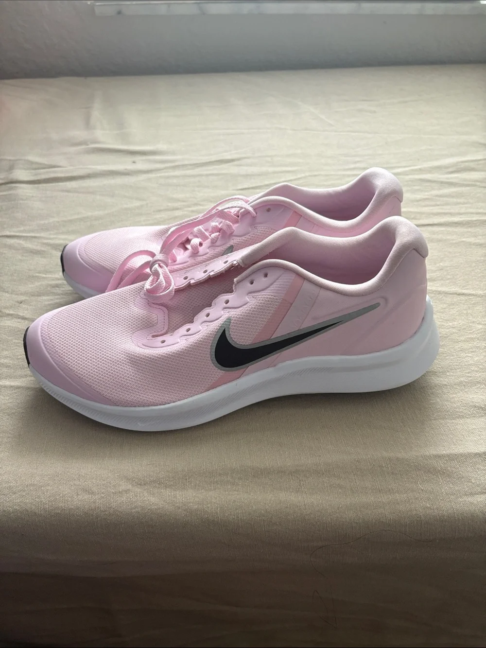 Nike Pink Women's Lightweight Running Shoes with Black Swoosh